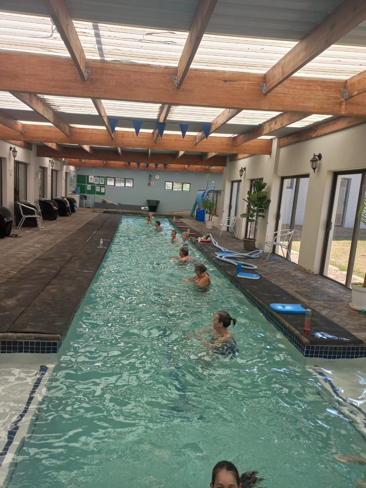 Water aerobics class participants at Easy2Swim
